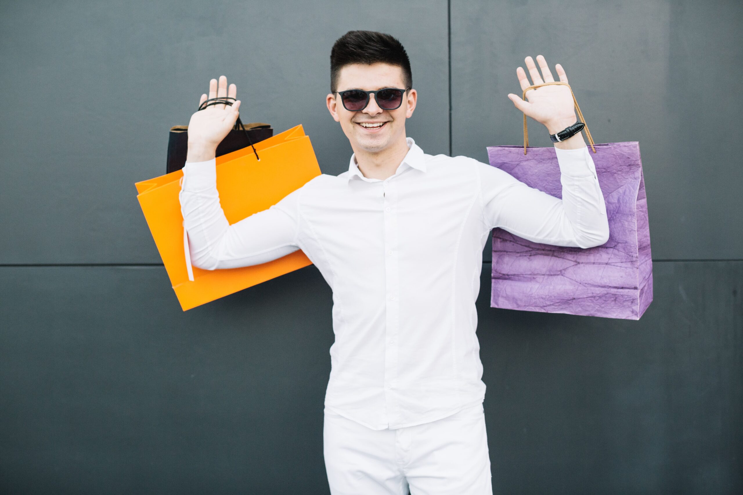 guy-holding-shopping-bags (1)